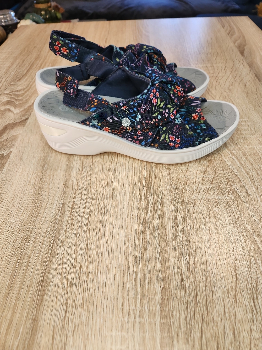 Bzees Daisy washable slingback wedge sandals featuring a navy floral print upper